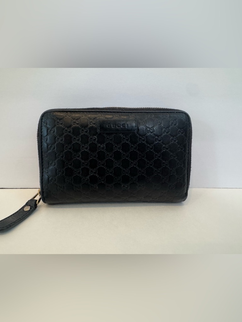 Gucci Black GG Embossed Zip Around Wallet - Leather